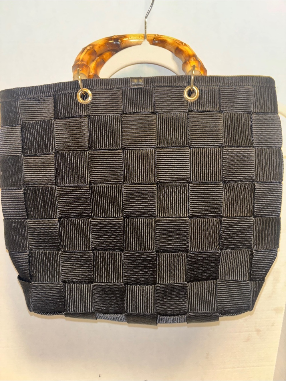 BLACK WOVEN TOTE BAMBOO STYLE HANDLES BRASS HARDWARE BLACK DRAWSTRING CLOSURE